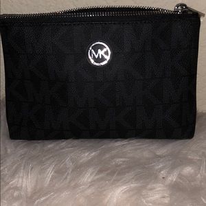 Like new Michael Kors black makeup bag